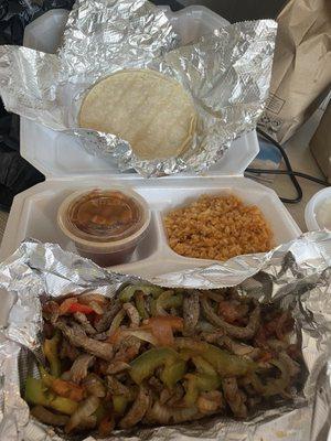 Beef fajitas - comes with rice, beans, guacamole, sour cream and tortillas