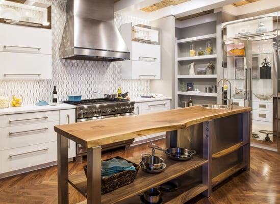 Beautiful contemporary kitchen cabinets with solid wood, stainless steel, and high gloss accents.  Tomball, TX - Greater Houston Area.