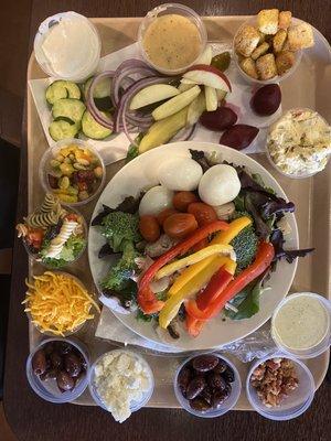 My one time trip to the salad bar , I had to make it worth it. I put all the dry veggies in my bowl and all my toppings in plastic cups