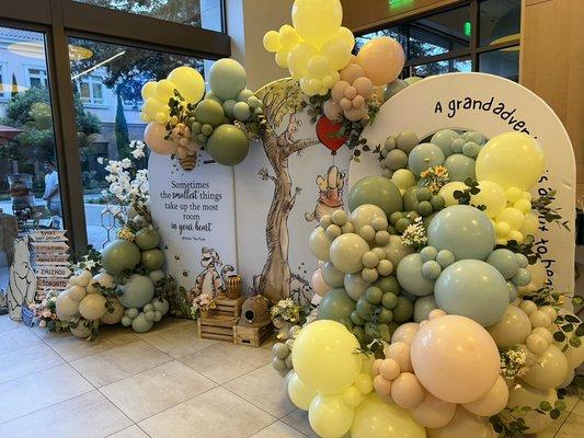 Baby Shower with Balloon Garlands and backdrops.