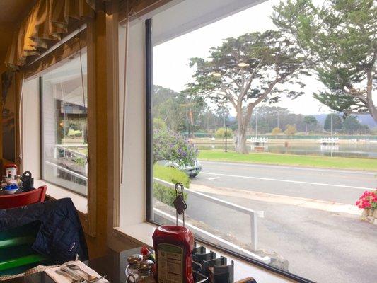 Large windows with views of park across the street