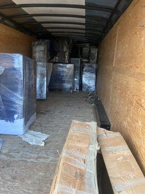 Trailer loaded furniture protection 
Moving blankets shrink wrap