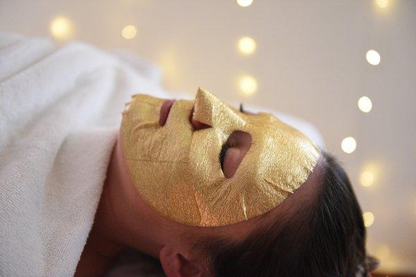 gold face mask after acupuncture