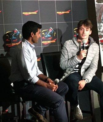 Karun speaks with Charles Leclerc at our event at the Canadian GP 2018