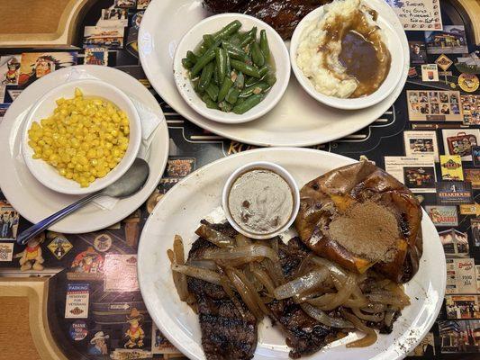 Ribs, 1/2 slab with green and mashed potatoes. Ribeye. 11 oz. with onions, and sweet potatoes and buttered corn.