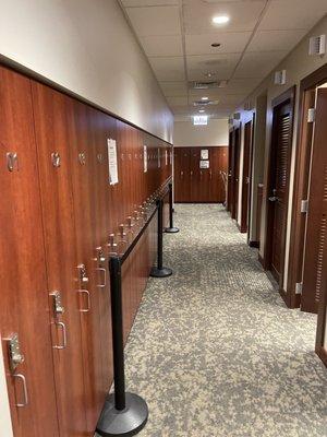 Lockers on the left, dressing rooms on the right.