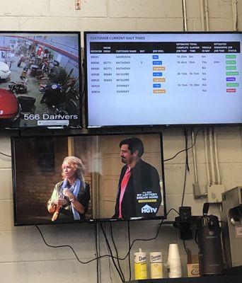 New "wait times" board in the morning airing area, so you know the status of your vehicle.  You can also watch your car being worked on.