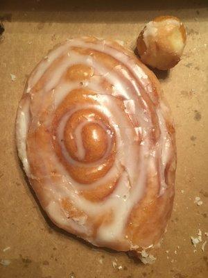 Always fresh, fast and friendly service.   (Donut hole shown next to Cinnamon Roll to show size)