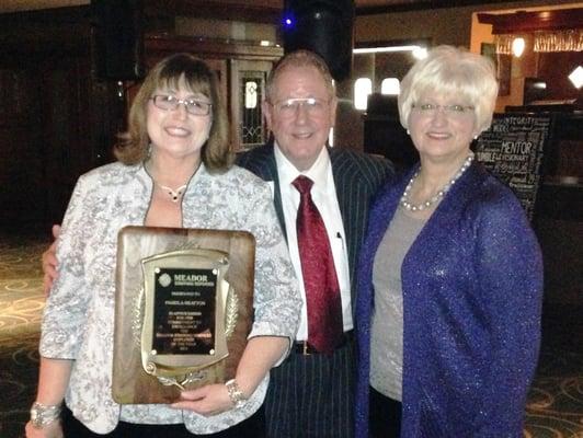 2013's Employee of the Year, Vice President, Pam Bratton, with Mr. and Mrs. Meador