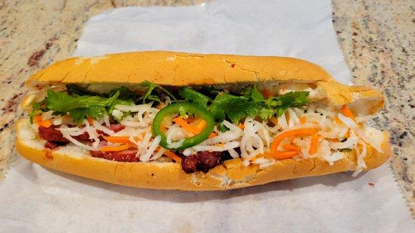 Barbecue pork banh mi with vegetables. Loaded the vegetables with a normal amount because we had extra from another restaurant.