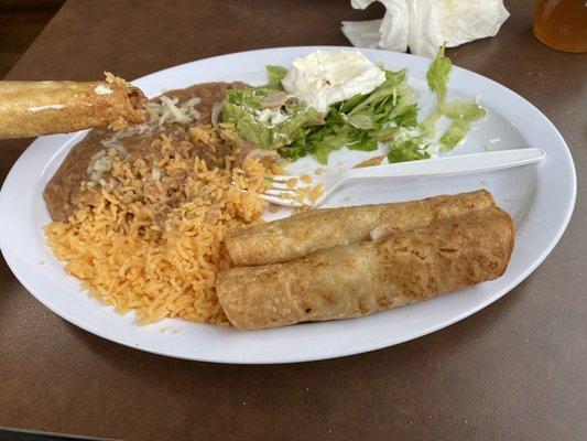 Shredded chicken flautas with a ácida sour cream rice and beans. Perfect.