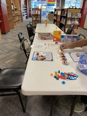 Game tables at the back of the store (free of charge)