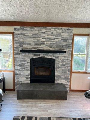 Fireplace and hearth project... Ledger stone, wish you could see the sparkle.