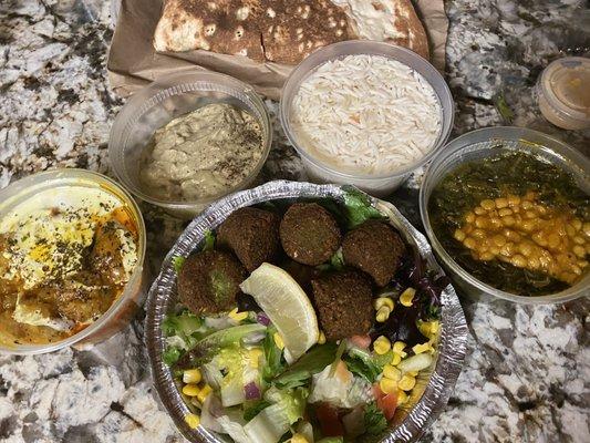 Baba Ghanoush, Sauteed Spinach, Baked Eggplant with Yogurt and Garlic, Falafel Salad five pieces