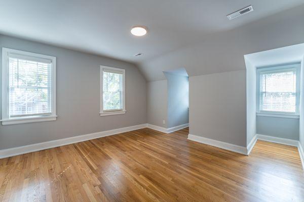 Bedroom with dormer windows