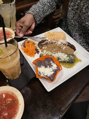 Trio of Enchiladas with a Top shelf Margarita.