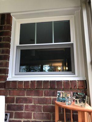 Window completed taken from the sunroom looking into the house.