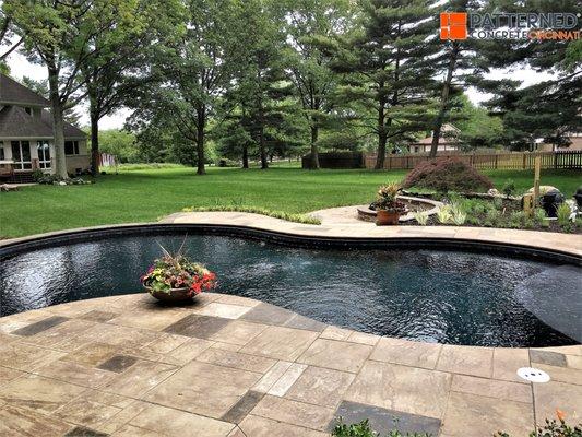 Stamped Concrete Pool Deck With Individual Coloring Accents