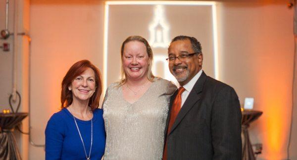 Courtney Fairchild (center) at Global Services 20th Anniversary Celebration with FEMA' Bridget Bean (left) and SBA's Antonio Doss (right).