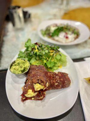 Almond roti Frankie ($10) - soft almond flour roti, scrambled eggs inside, and a spiced avocado mash.  The herb salad was derrishhhhh