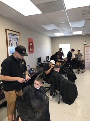 Donating free hair cuts, kids program