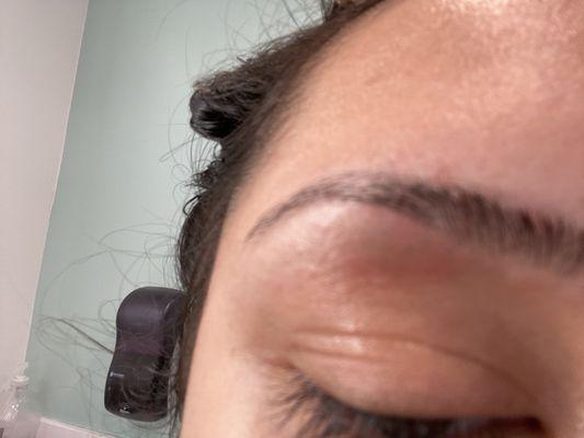 Eyebrow after being waxed and plucked