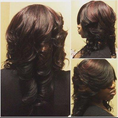 Full head quick weave layered and curled. Stylist: Jessica