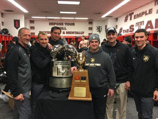 Dr. Ness with the team's orthopedic surgeons and the Commander in chief's trophy.