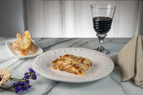 Family-Size "Classic Bolognese" made with a rich slow-cooking beef ragout & an innovative Béchamel, serving four people