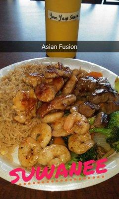 Hibachi Shrimp, Chicken and Steak with fried rice and vegetables