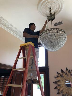 Newport, Rhoide Island.  Chris' main field of expertise is Crystal Chandeliers.  Includes: cleaning, installations, crating and shipping.