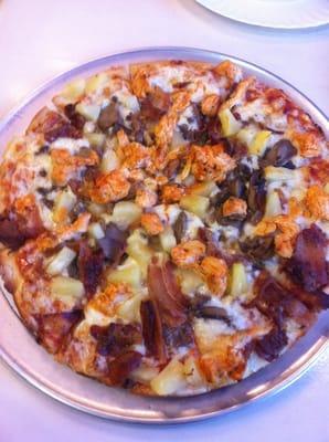 6 toppings -- pineapple, buffalo chicken, mushroom, cheese, hamburger and bacon.