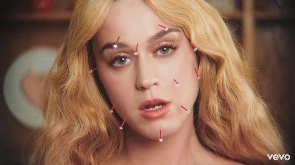 Katy Perry getting Acupuncture for her music video