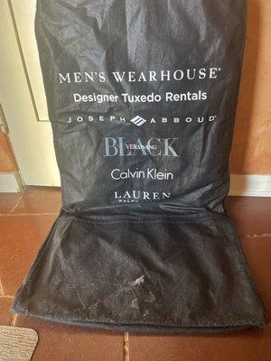 Old Garment  Bag supplied by Men's Wearhouse with what appears to be vomit from a prior customer.