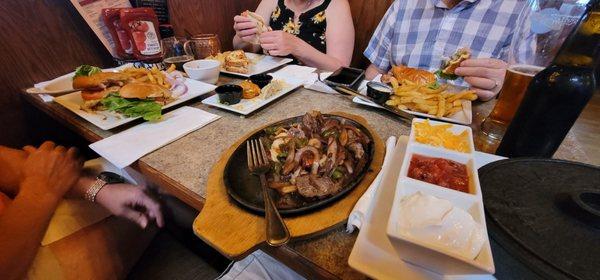 Phoenix fajitas (Shrimp and steak), Prime French Dip,DIP, The Cranberry Turkey, Bacon Cheeseburger... clockwise from bottom.