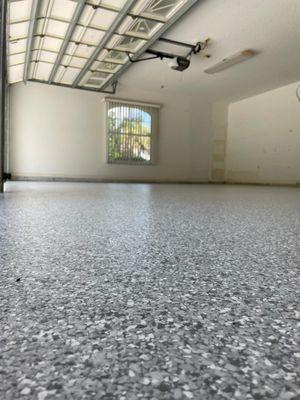 A fully renovated garage with our epoxy floor colors.