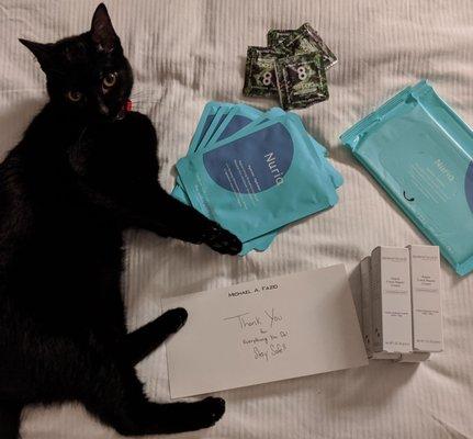 A week into our COVID assignment, encouragement and goodies from Michael Fazio! Shown with my cat who Prime helped me bring.