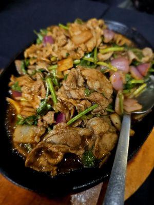 Cumin Lamb On Sizzling Plate. More cumin and less spice than normal but tasty. Nicely flambeed at the table