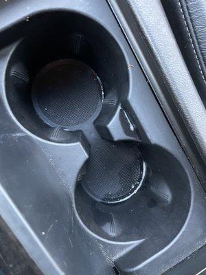 Cup holder not cleaned.