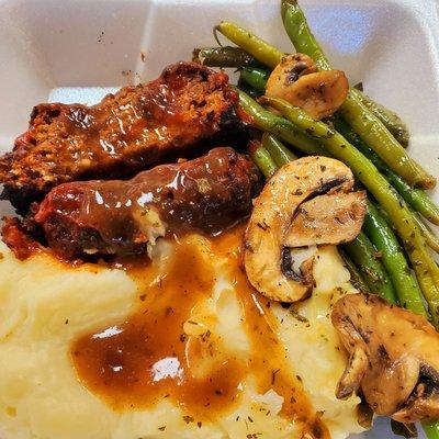 Vegan Meatloaf along with Mash Potatoes ,  sautéed Asparagus and Mushrooms