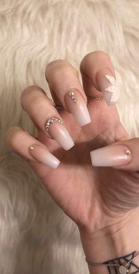 Ombré Nails with flower and rhinestone design