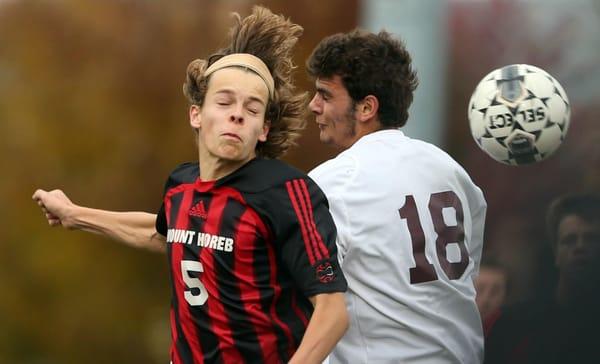 Jeremy Gundlach of Mt. Horeb heads the ball during a WIAA regional play-off game.