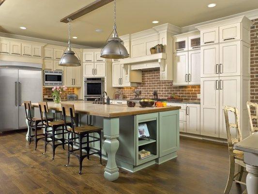 Gourmet Kitchen remodel maximizes space and includes over-sized island to accommodate dining, and additional storage.