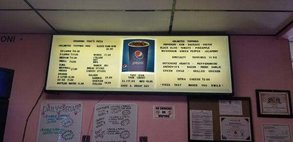 Current board menu. The online menu is a lot clearer and seems to have different pricing for some items like extra toppings.