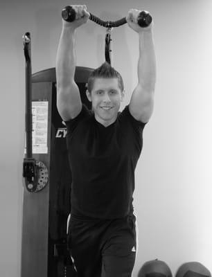 Andrew shows how to do the tricep extension exercise.