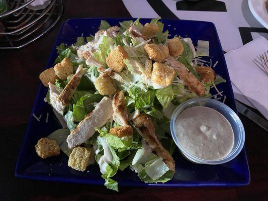 Caesar Salad with chicken. It really fills you up and large portions. Caesar dressing is really good.