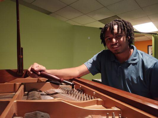 Wesley Tuning a Customer's piano