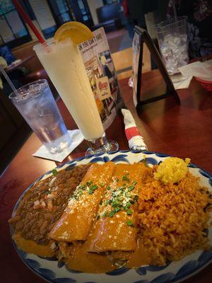 Chipotle chicken enchiladas and pina colada