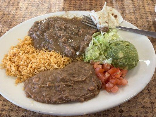 Carne guisada plate (other tortillas not shown)