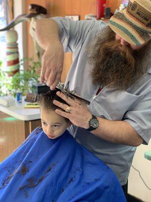 They have a tv so the kids can watch it during their haircut